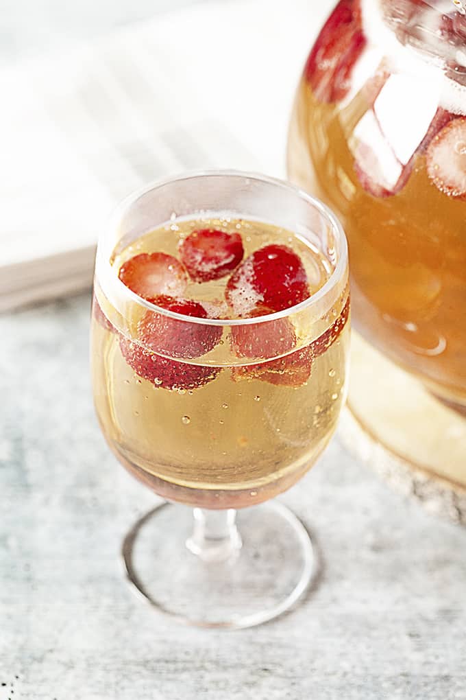 Glass of punch with strawberries