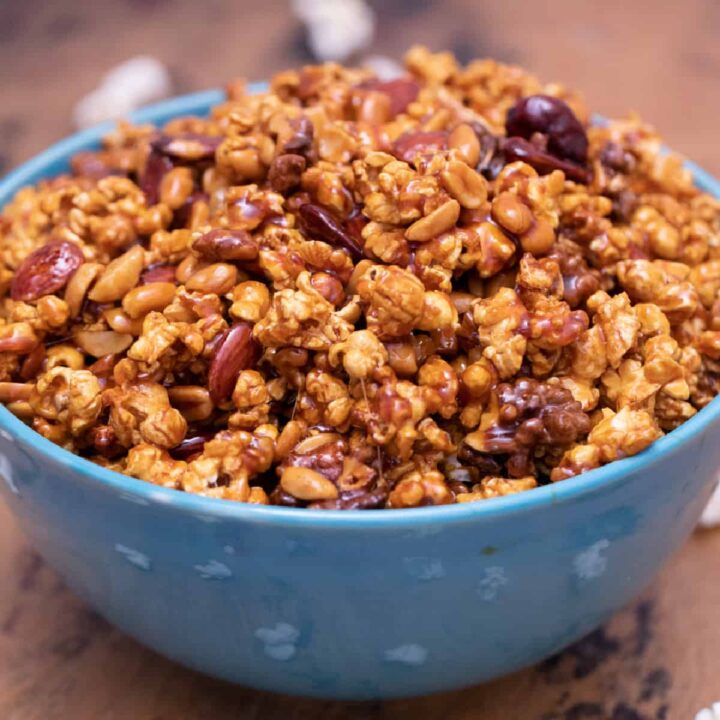 Blue bowl of poppycock popcorn.