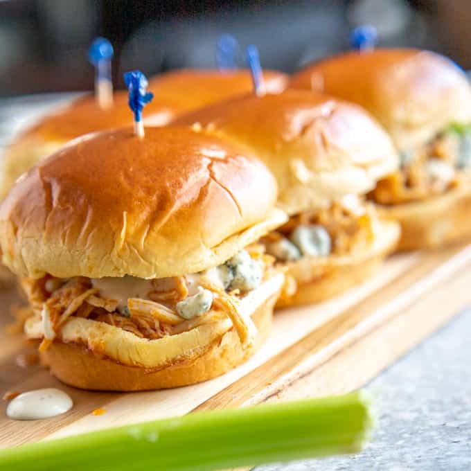 buffalo chicken sliders on a board