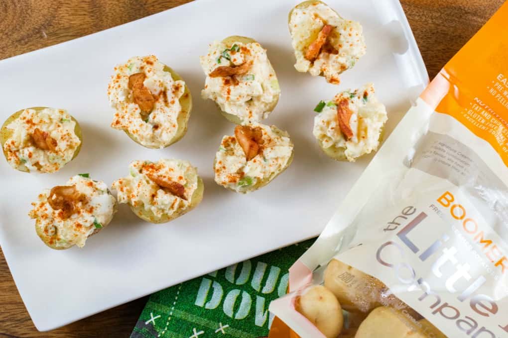 Overhead view of stuffed potatoes on a platter