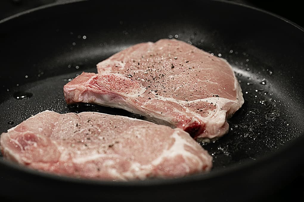 Pork chops in a fry pan
