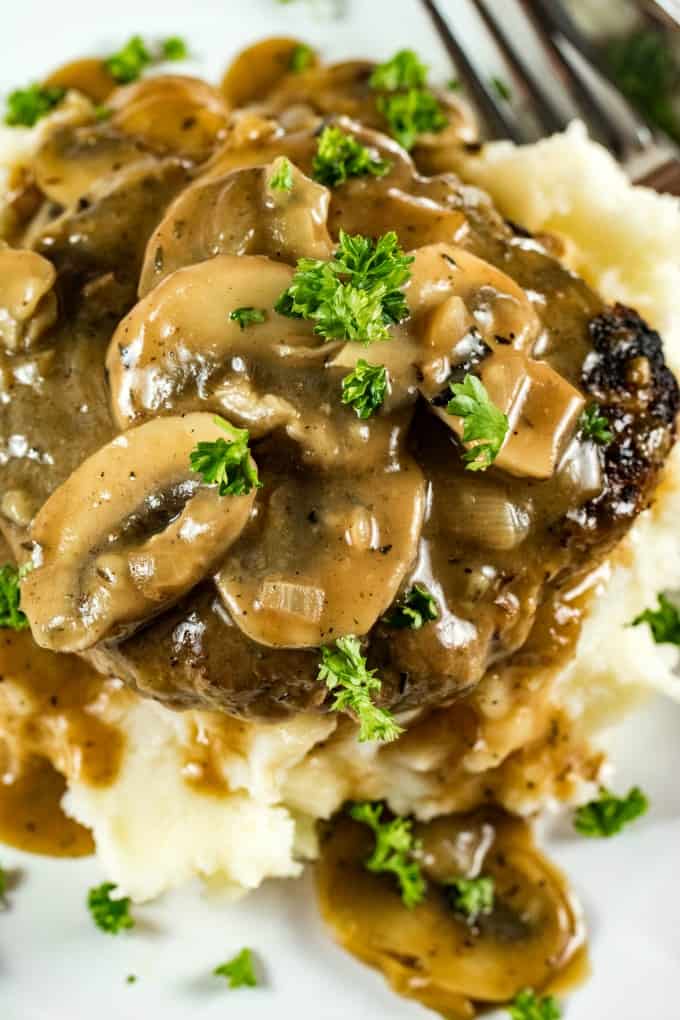 Overhead of mushrooms on Salisbury Steak