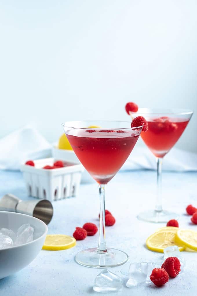 Chambord Bramble Cocktail with raspberries and lemons