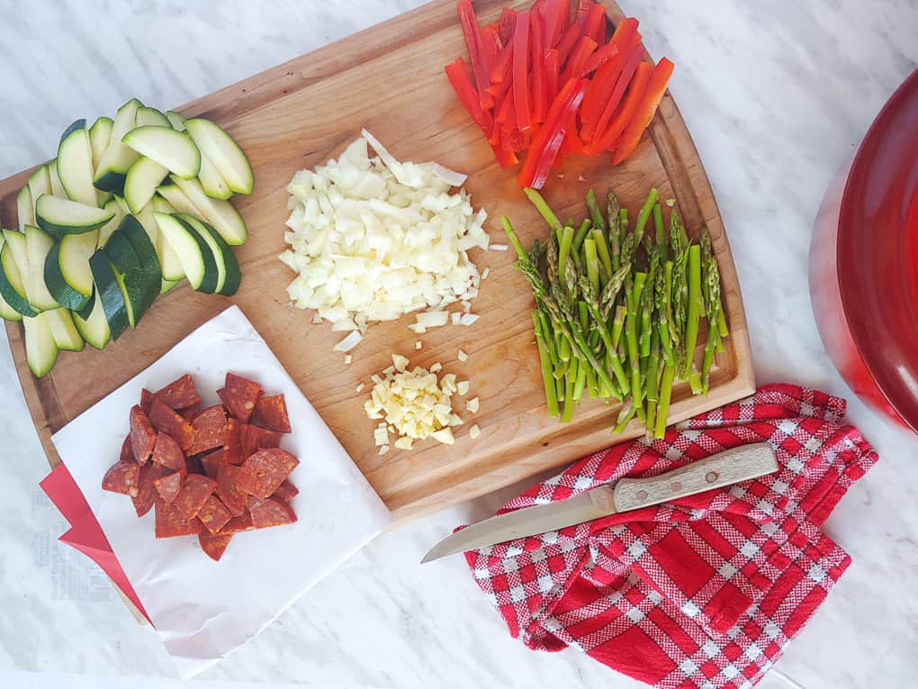 Ingredients on a cutting board for Easy Chorizo Pasta