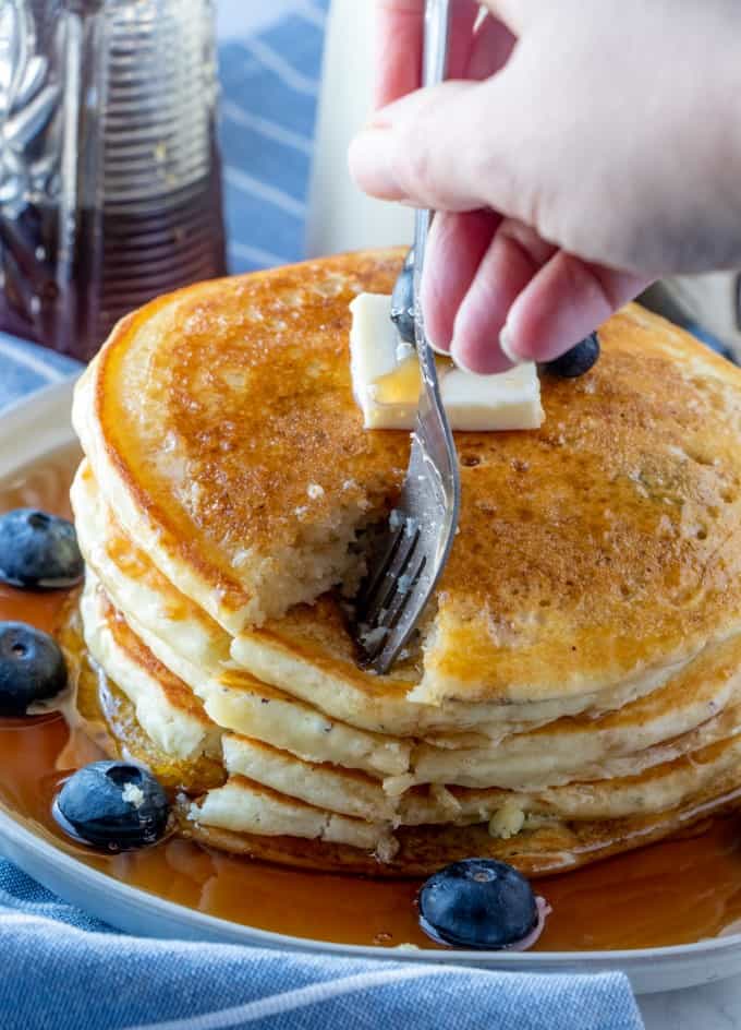 Forking into a stack of pancakes