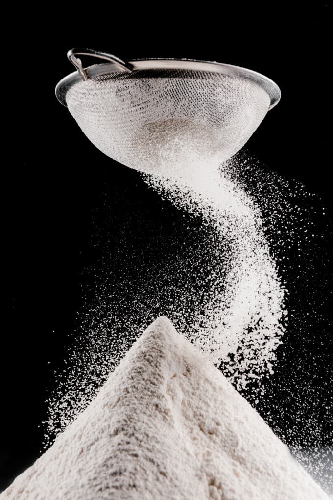 Flour coming out of a sifter