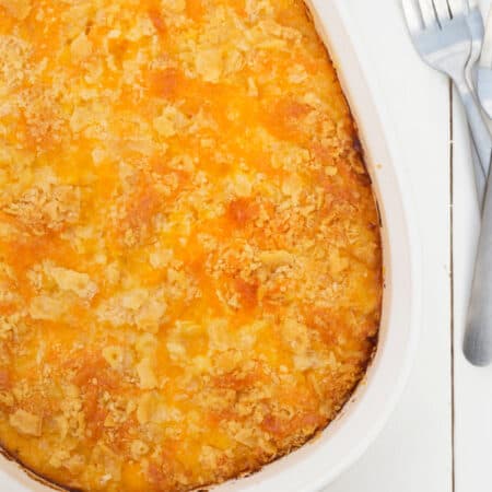 Overhead shot of Old Time Squash Casserole in an oval white dish.