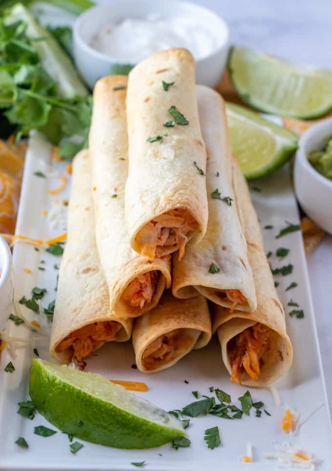 Baked Chicken Flautas (Rolled Tacos) on a plate