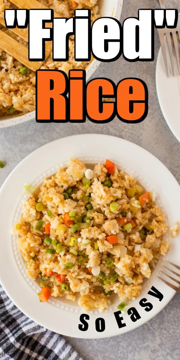 This Easy "Fried" Rice is fluffy and full of flavor. It can be made quickly using just made rice so no need to pre-plan! #friedrice #easyrice #Chineserice