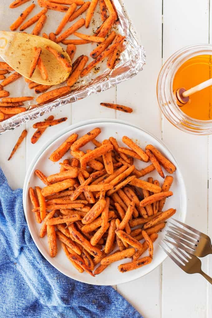 Overhead shot of carrots on a white plate