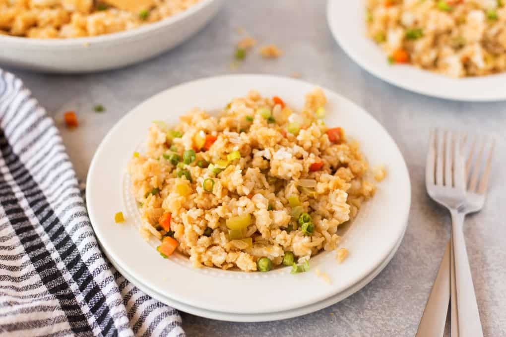 Fried Rice on a white plate with forks