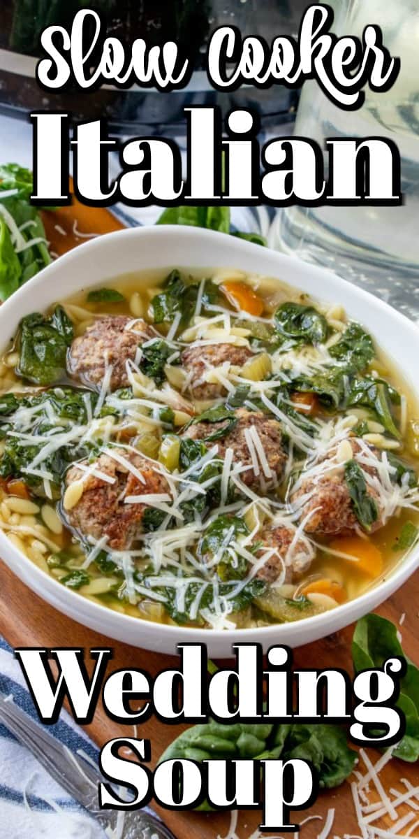 This hearty, healthy Slow Cooker Italian Wedding Soup will quickly become a favorite in your house as it has ours. Filled with chicken broth, carrots, onions, celery, spinach, and tiny meatballs it is a soup to ponder and enjoy! #ItalianWeddingSoup #slowcooker #soup