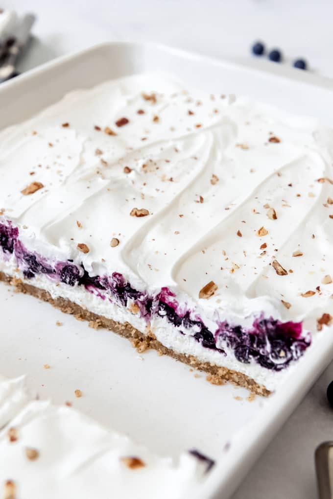 Blueberry delight - a pan of no bake blueberry lush in a white pan.