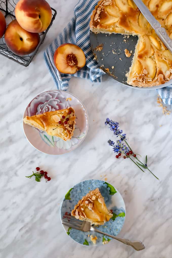 Overhead shot of plates with peach pie