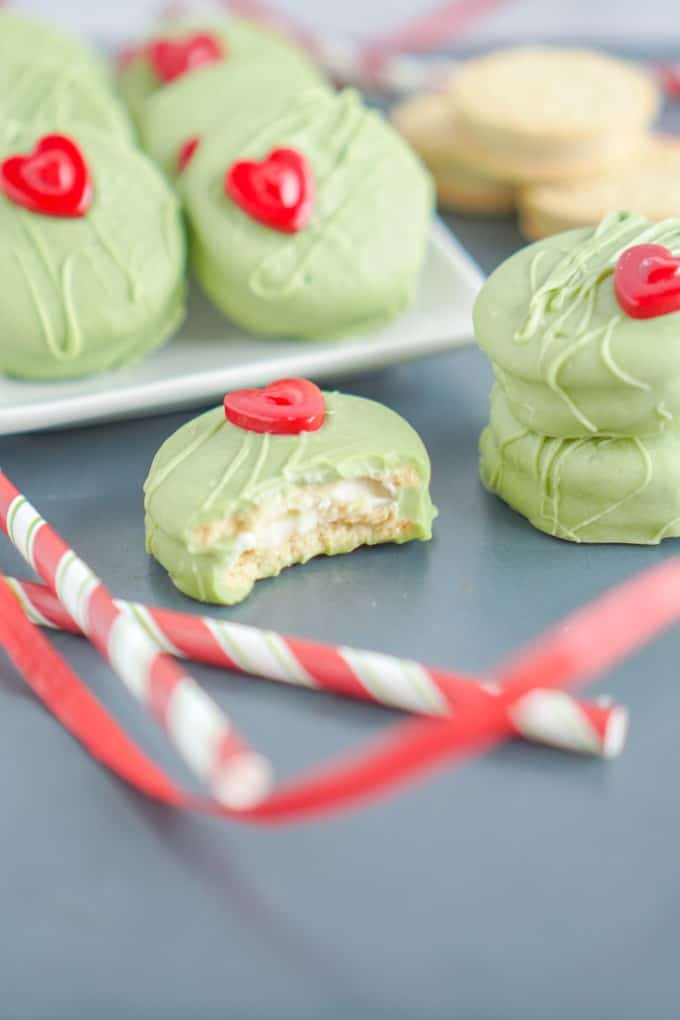 A Grinch cookie with a bite taken out. 