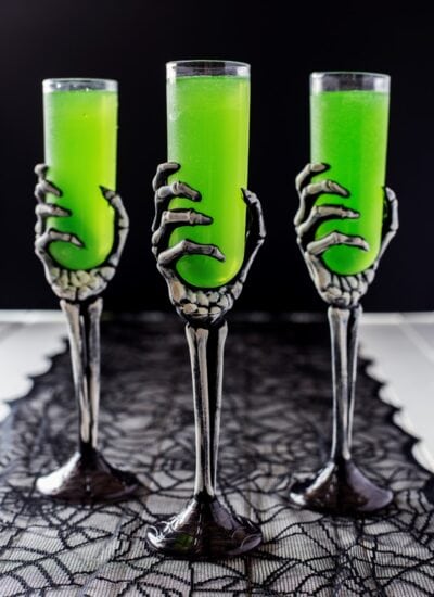 Three Embalming Fluid Cocktails in skeleton glasses.