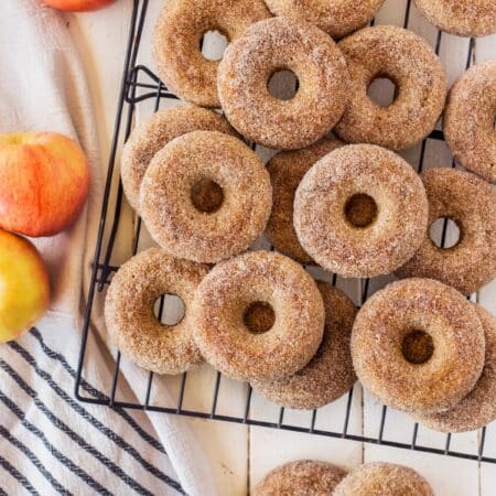 Donuts on a cooling rack.