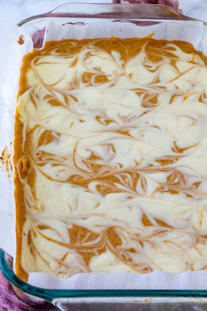 Overhead view of swirls in cheesecake. 