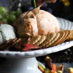 Close up of a knife in a pumpkin cheese ball