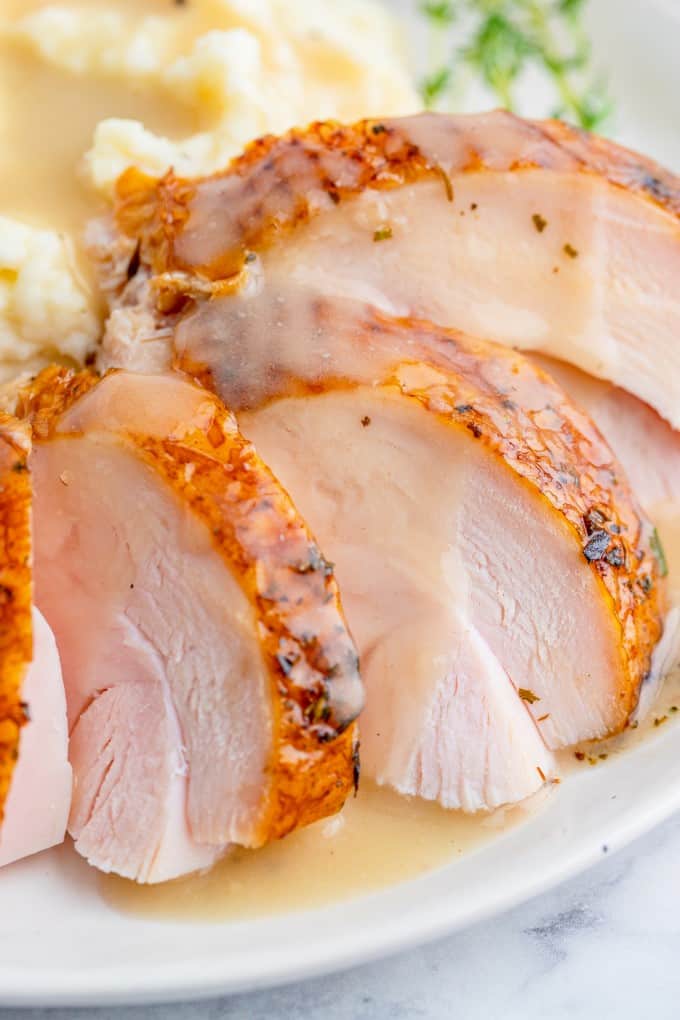 Close up of sliced turkey breast with gravy