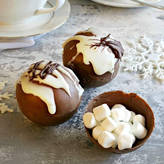 Showing the inside of a hot chocolate bomb with two balls finished. 