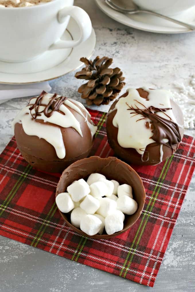 Hot Chocolate Bombs on a plaid background