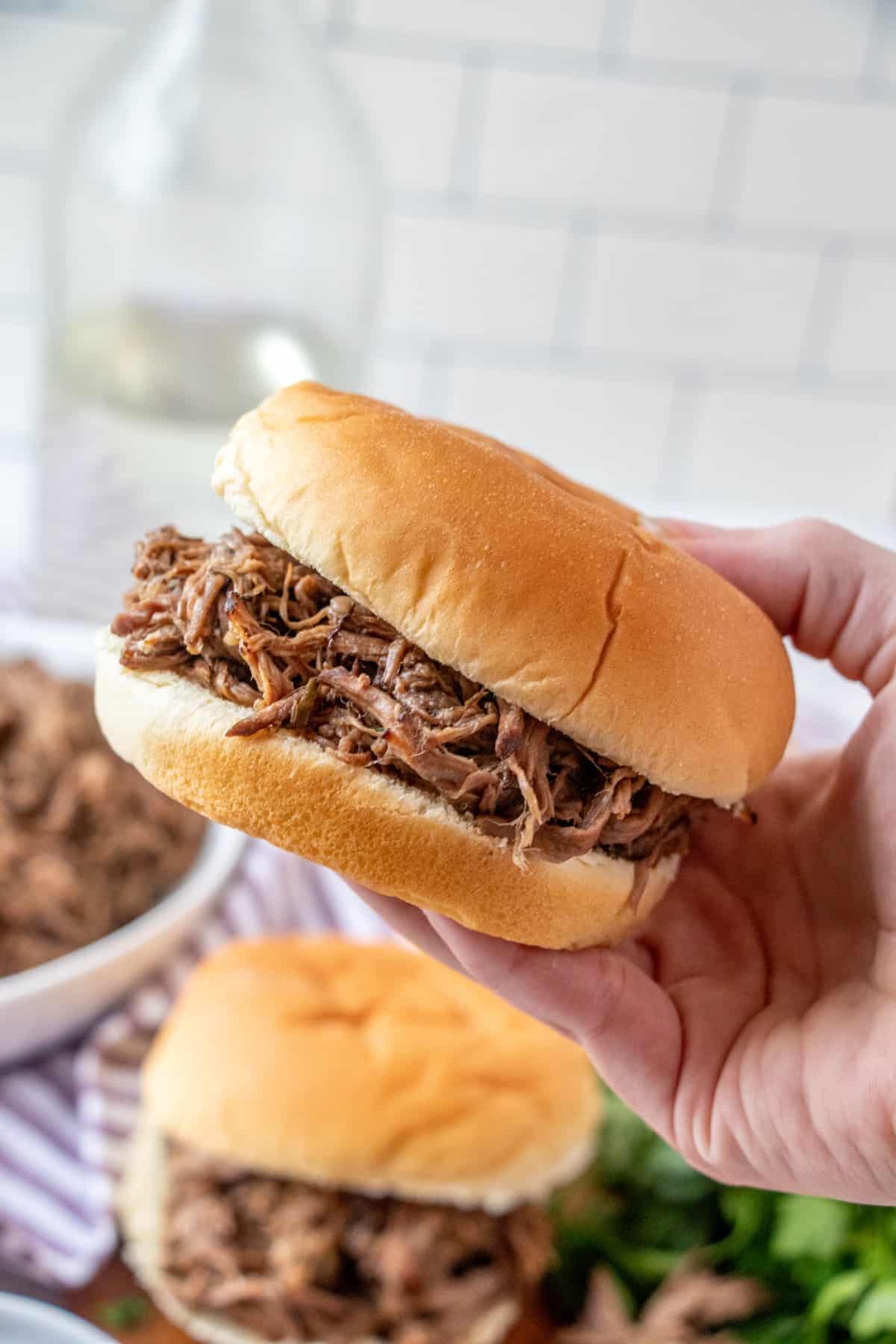 Holding a beef dip sandwich