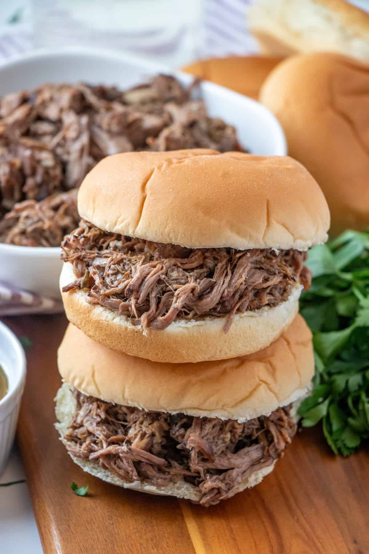 Two beef dip sandwiches stacked