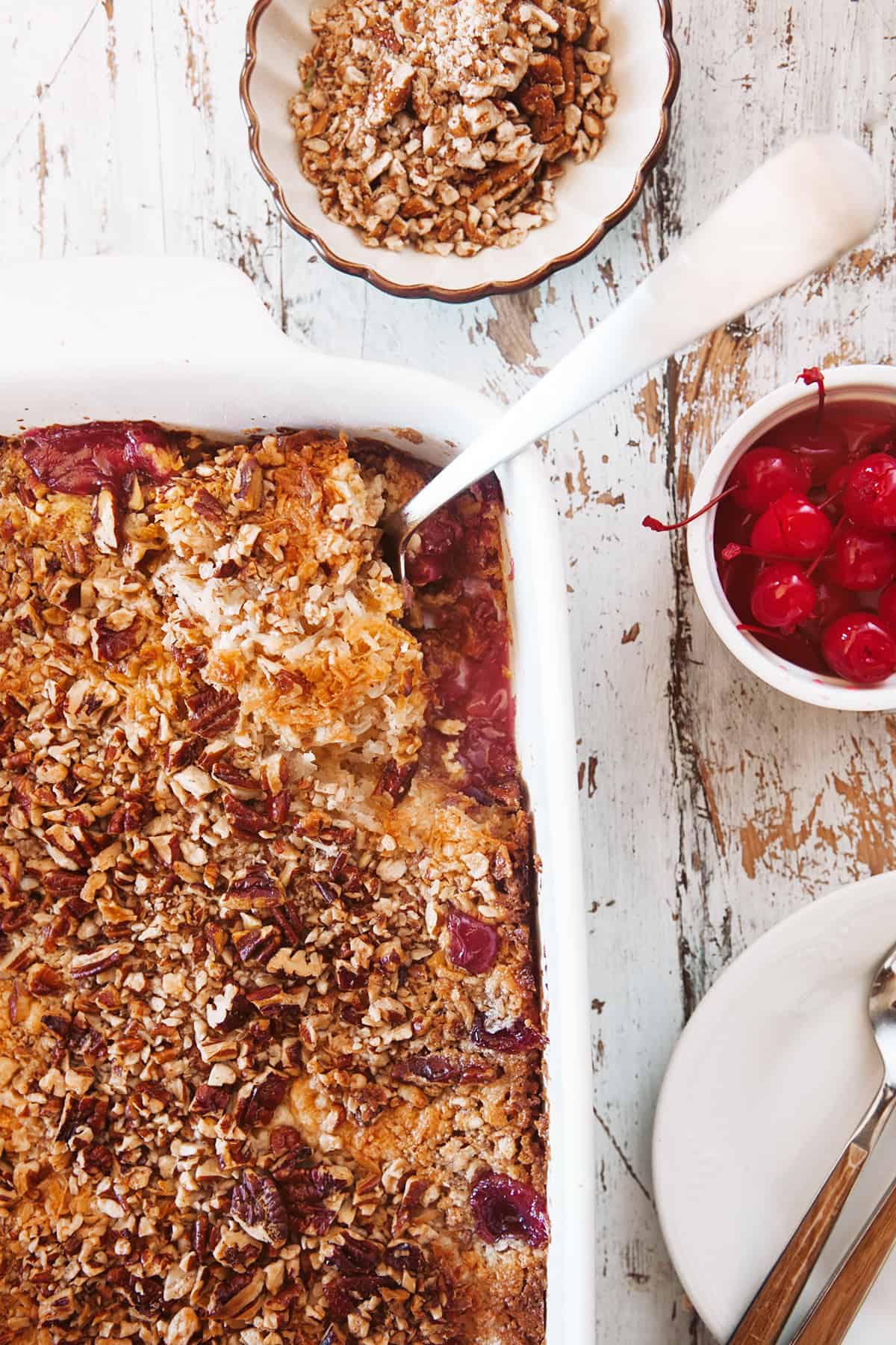 Spooning out a dump cake. 