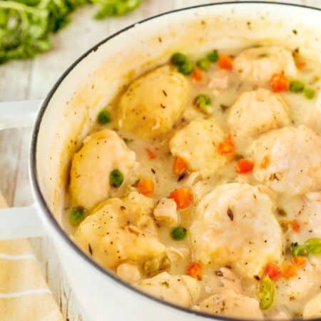 Chicken and Dumplings cooking in a large pot.