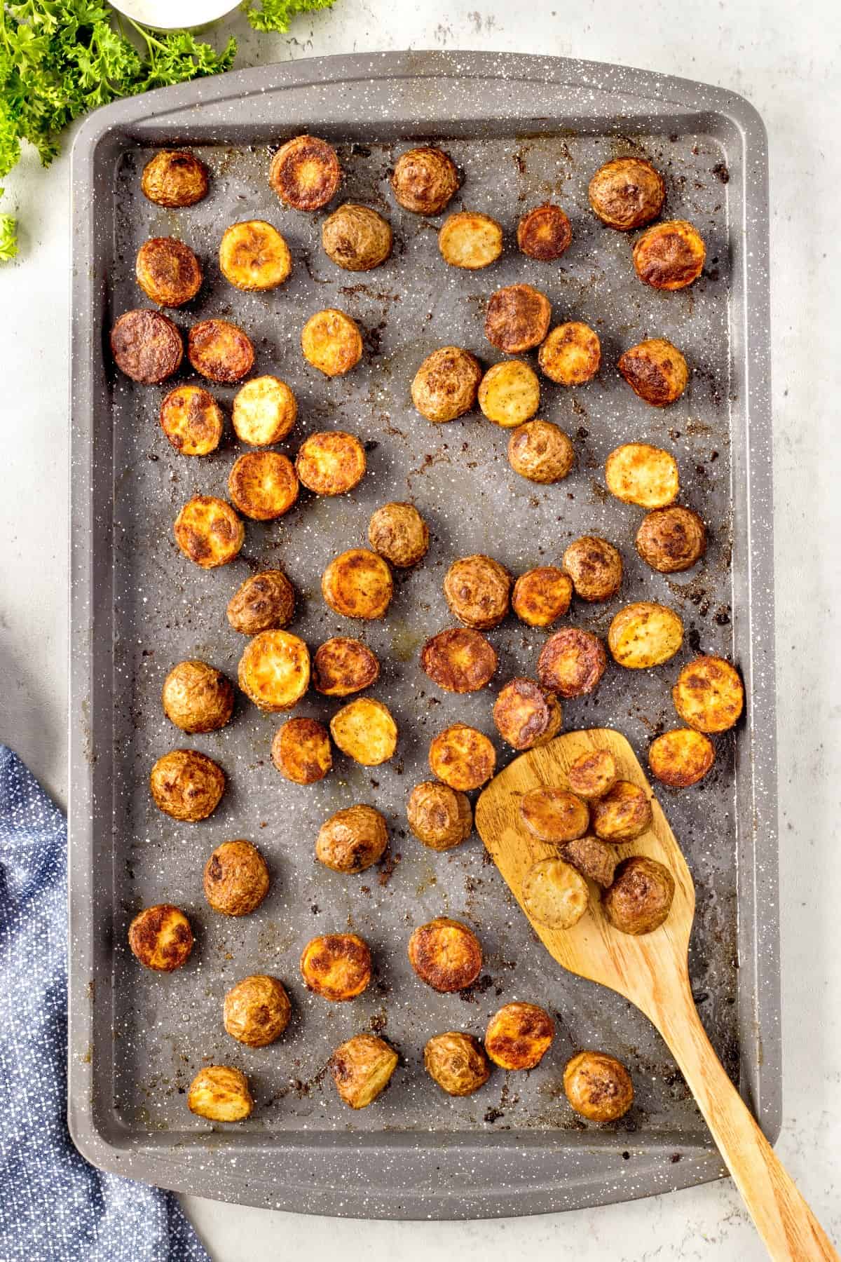 Overhead of roasted potatoes on a baking sheet