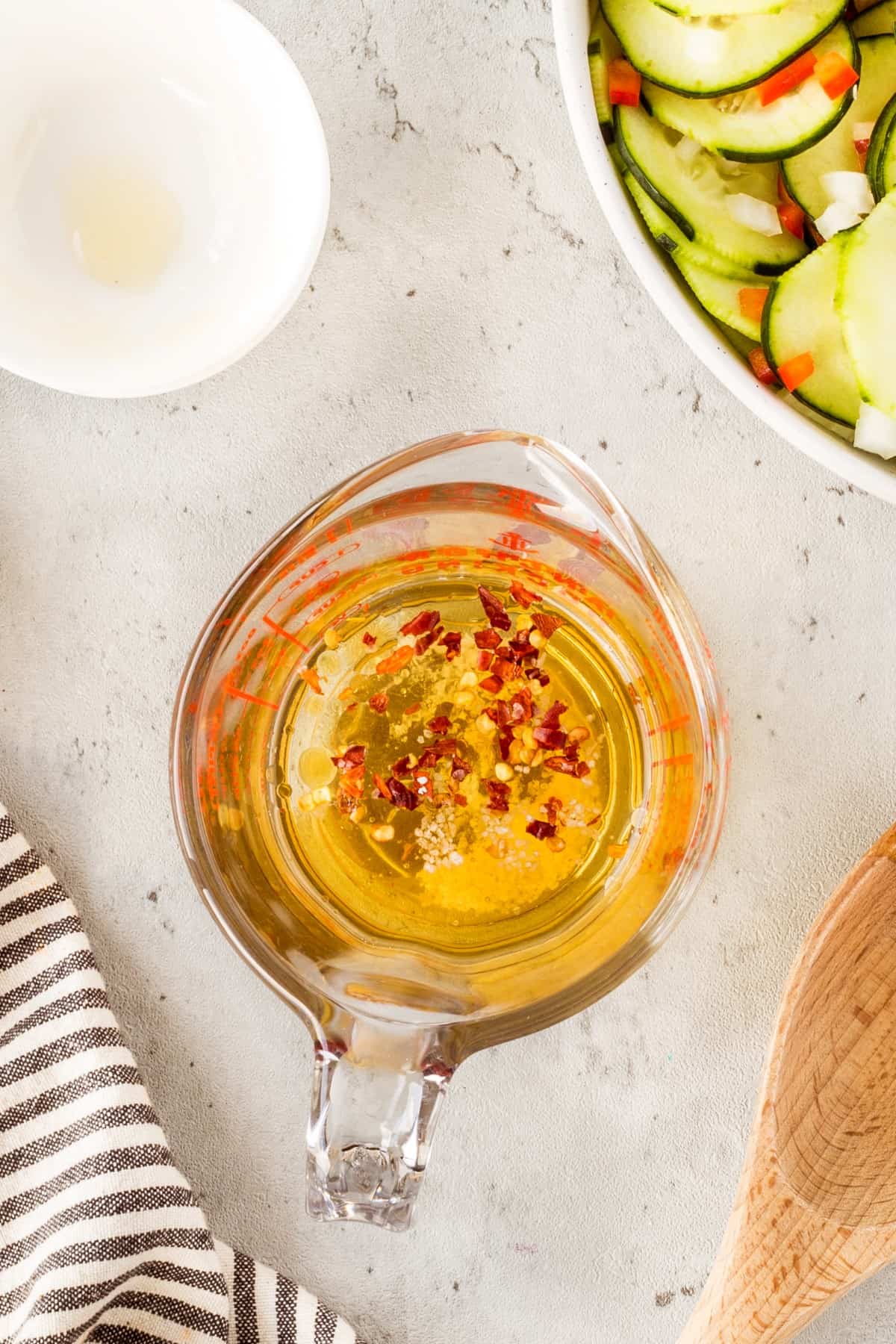 Salad dressing in a measuring cup