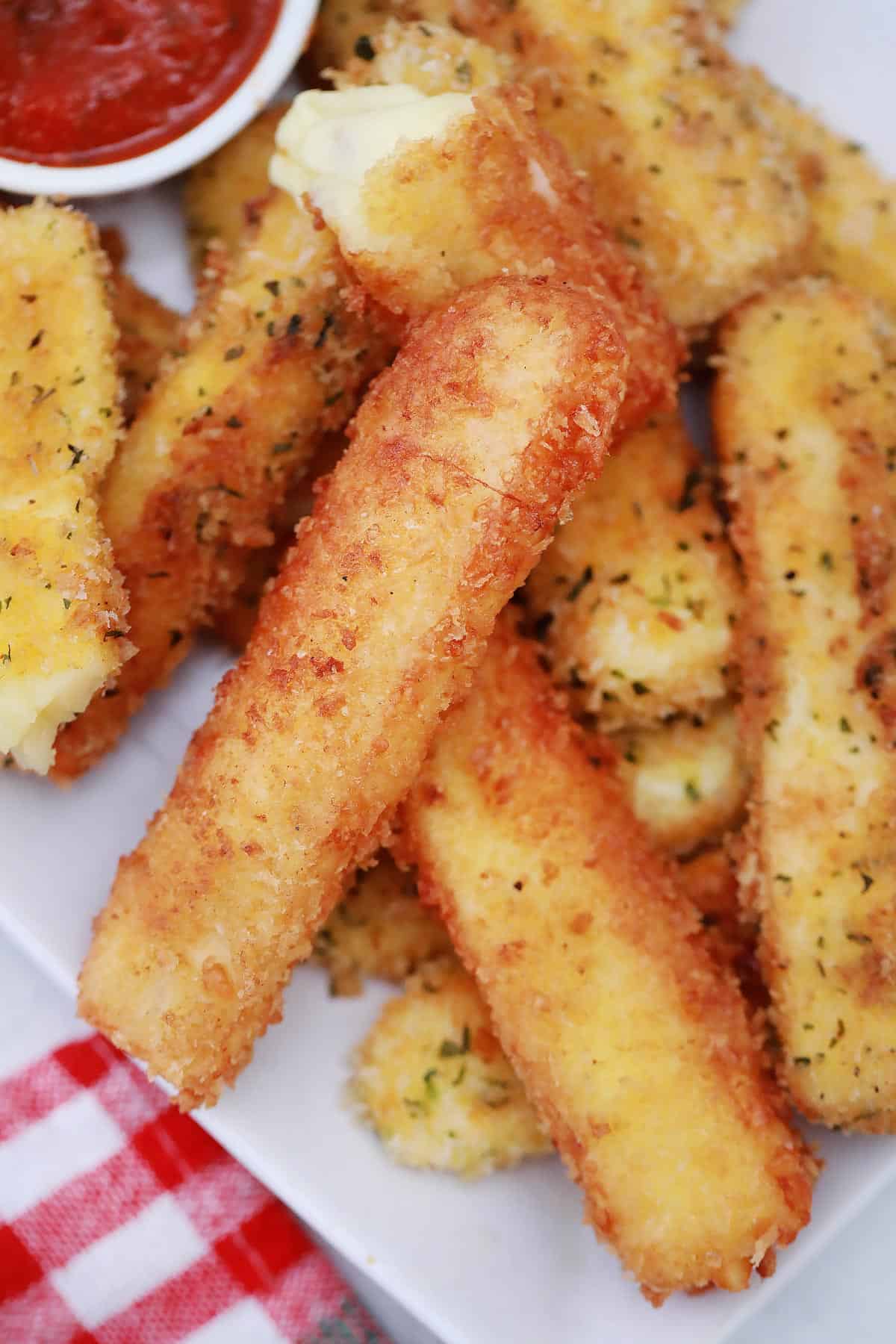 Close up of mozzarella cheese sticks. 