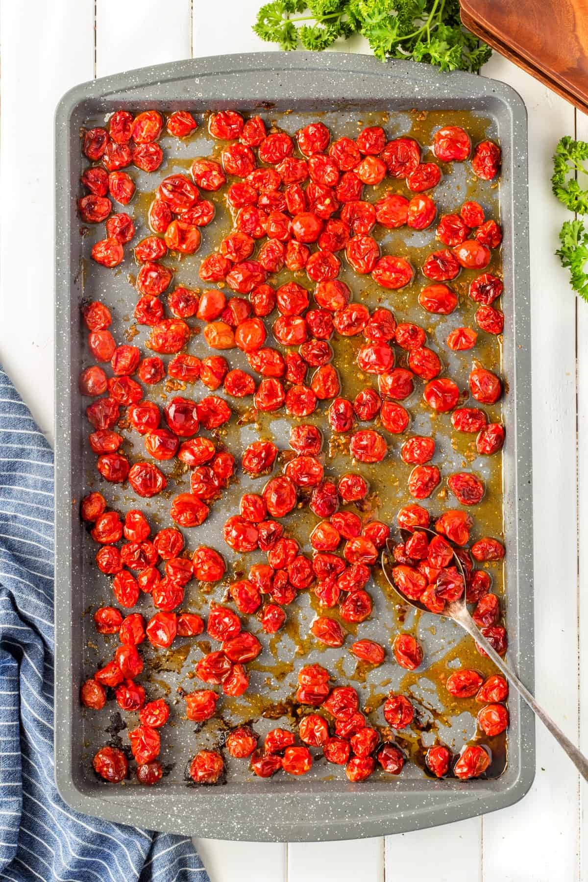 Roasted Grape Tomatoes on a baking sheet. 