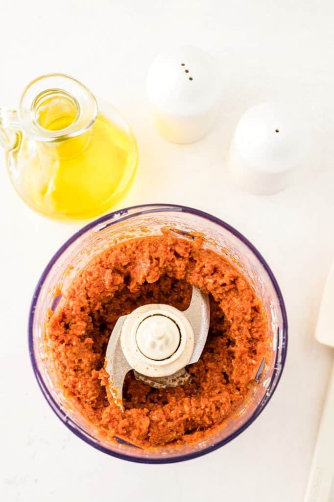 Sundried Tomato Red Pesto ingredients blended in a food processor