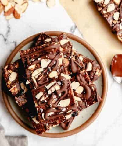 Chocolate Cherry Granola Bars stacked on a plate