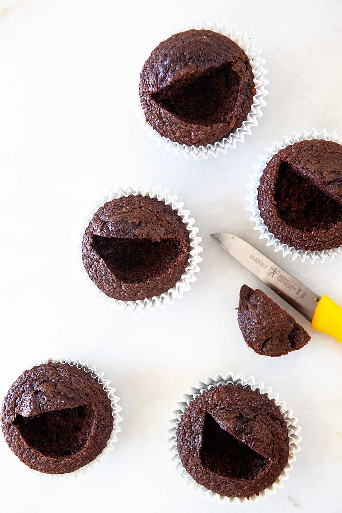 Cutting big smiles out of cupcakes