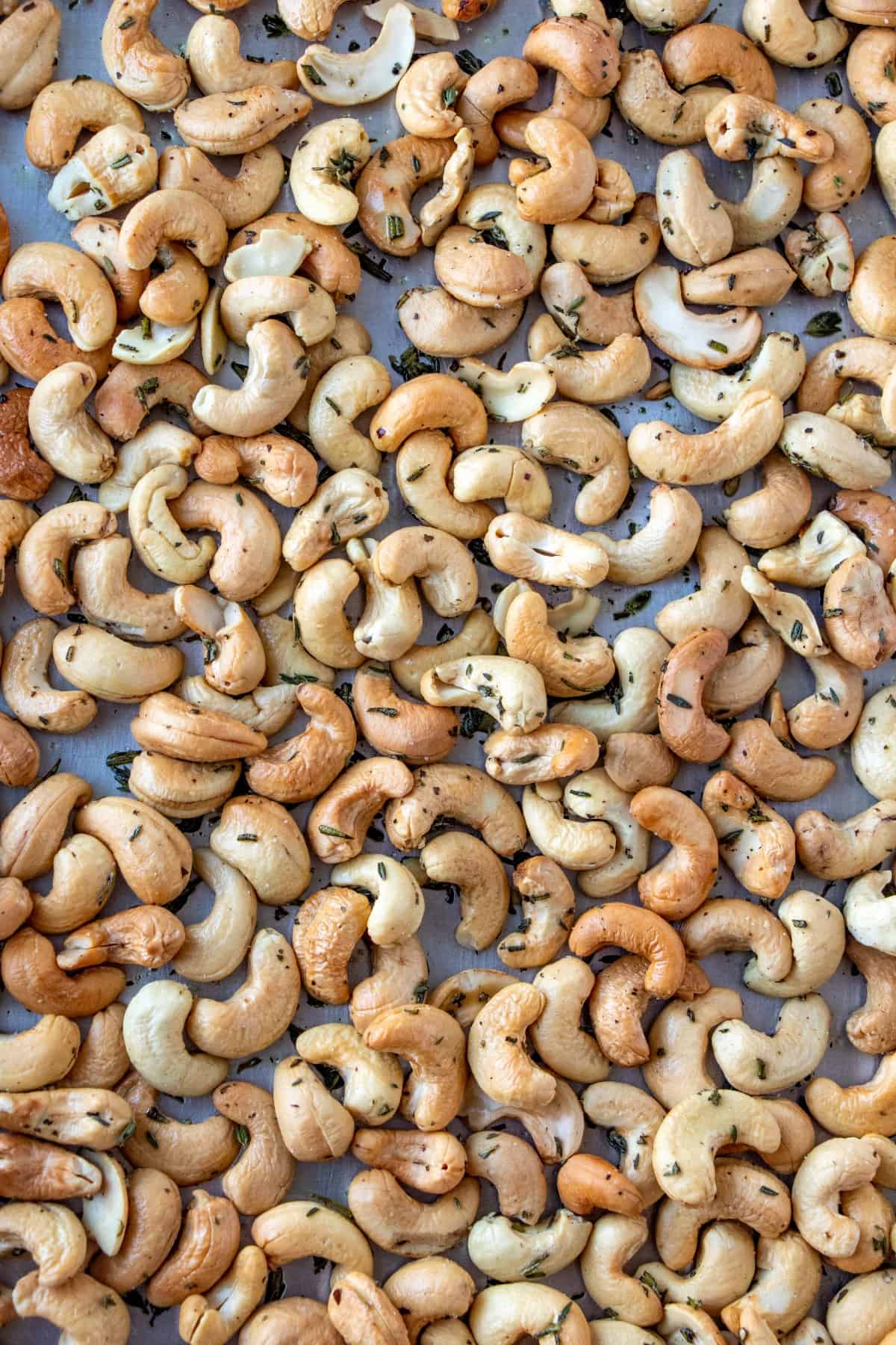 Herb Roasted Cashews on a baking sheet. 