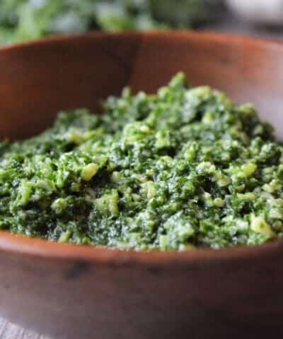 Kale pesto in a wooden bowl