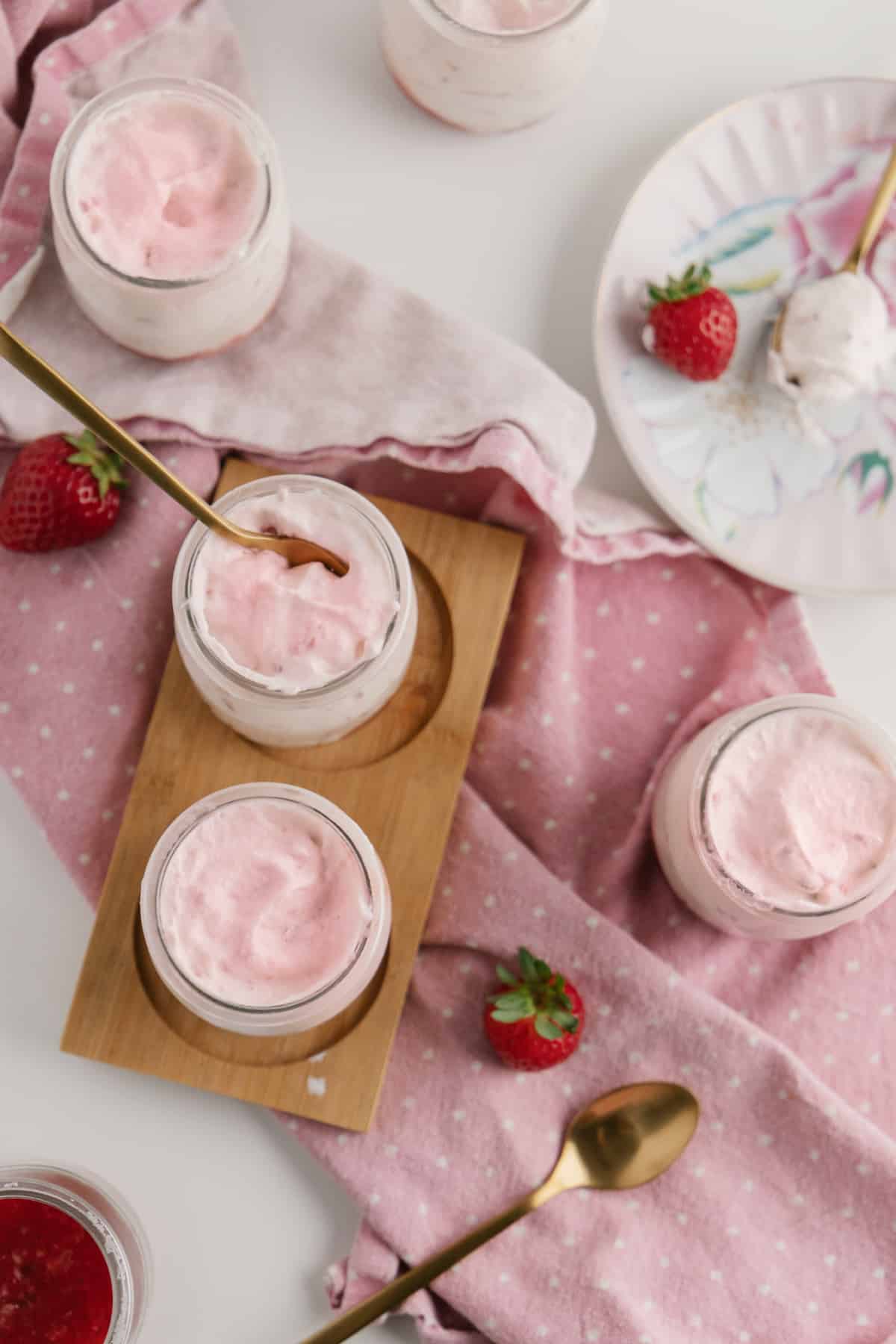 Overhead shot of jars of strawberry mousse