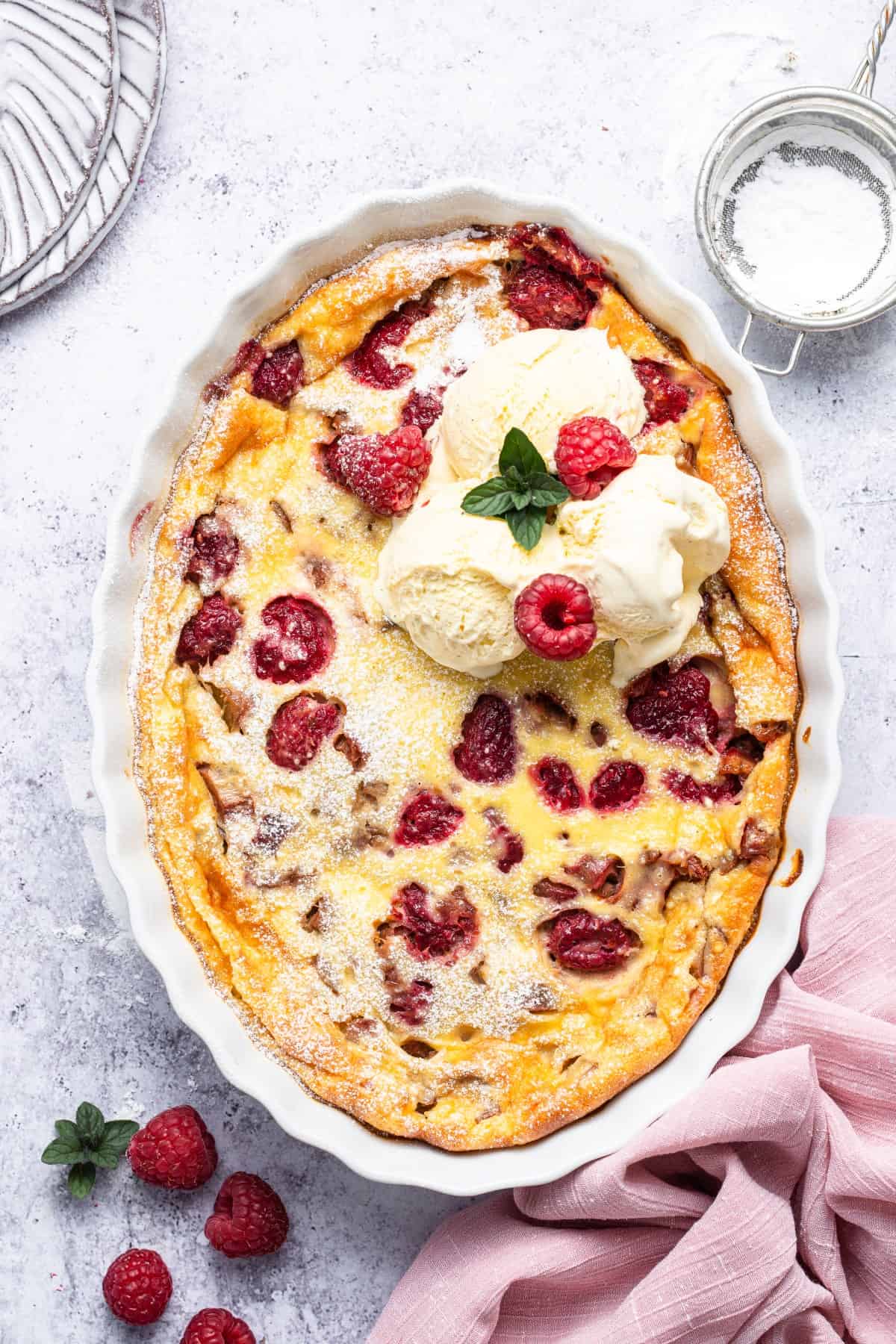 Clafoutis with ice cream and fresh raspberries