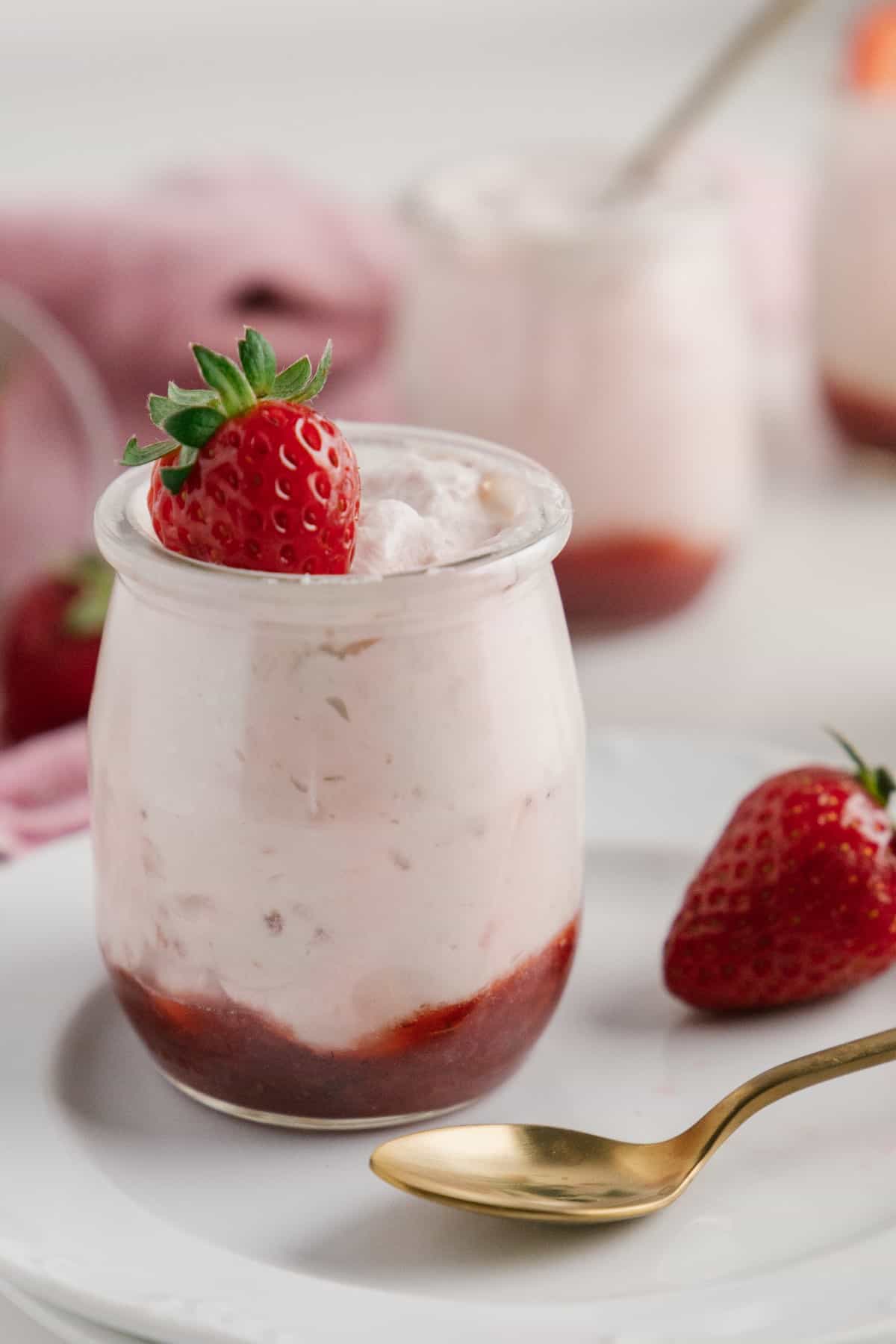 Closeup of a jar of strawberry mousse