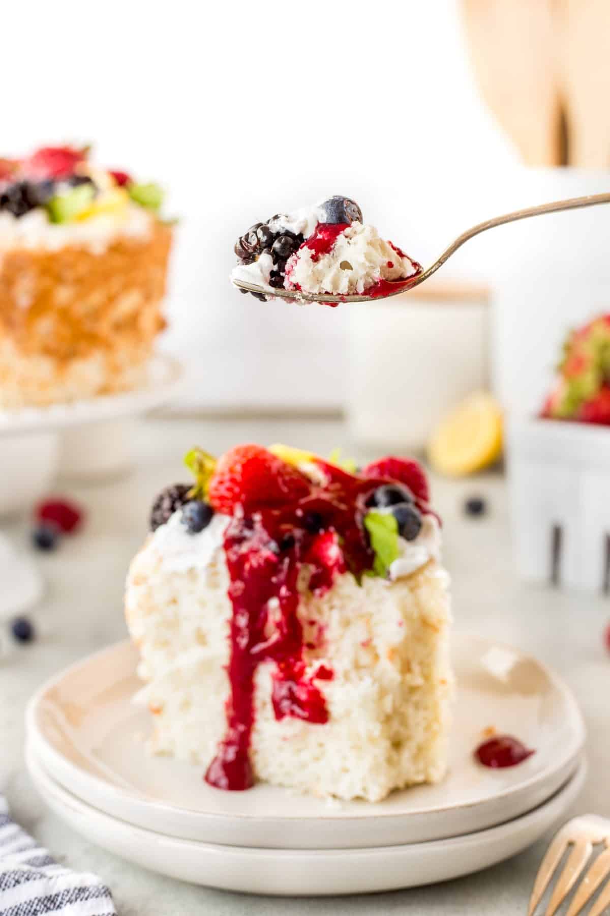  A forkful of cake and berries