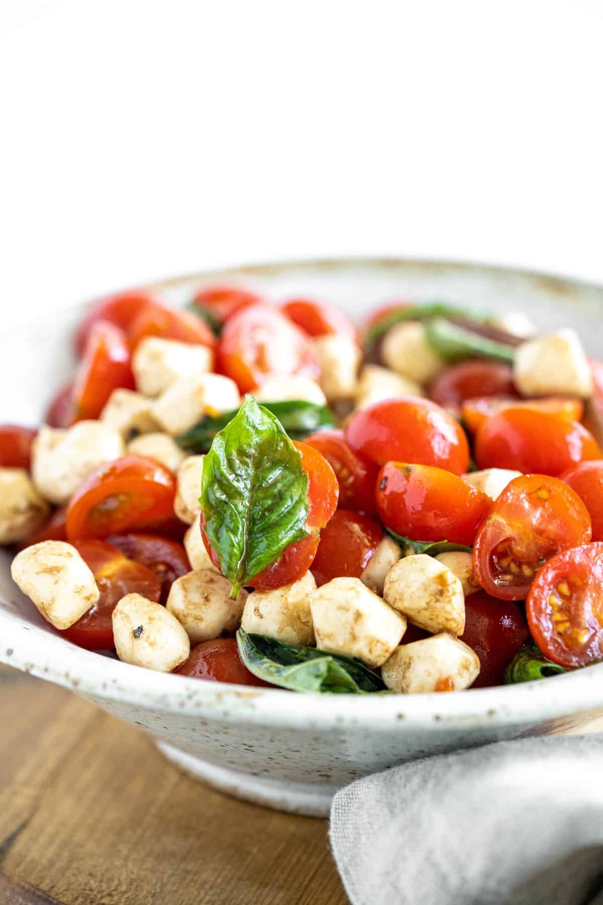 Closer view of caprese salad in a bowl