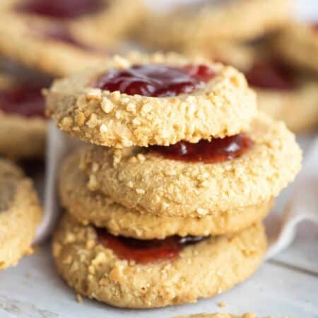Peanut Butter and Jelly Cookies stacked.