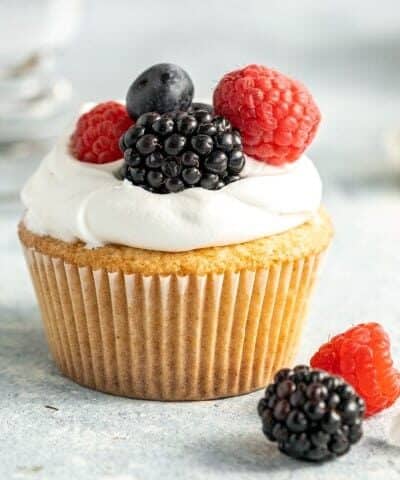 Homemade Pound Cake Cupcake with whipped cream and fresh berries