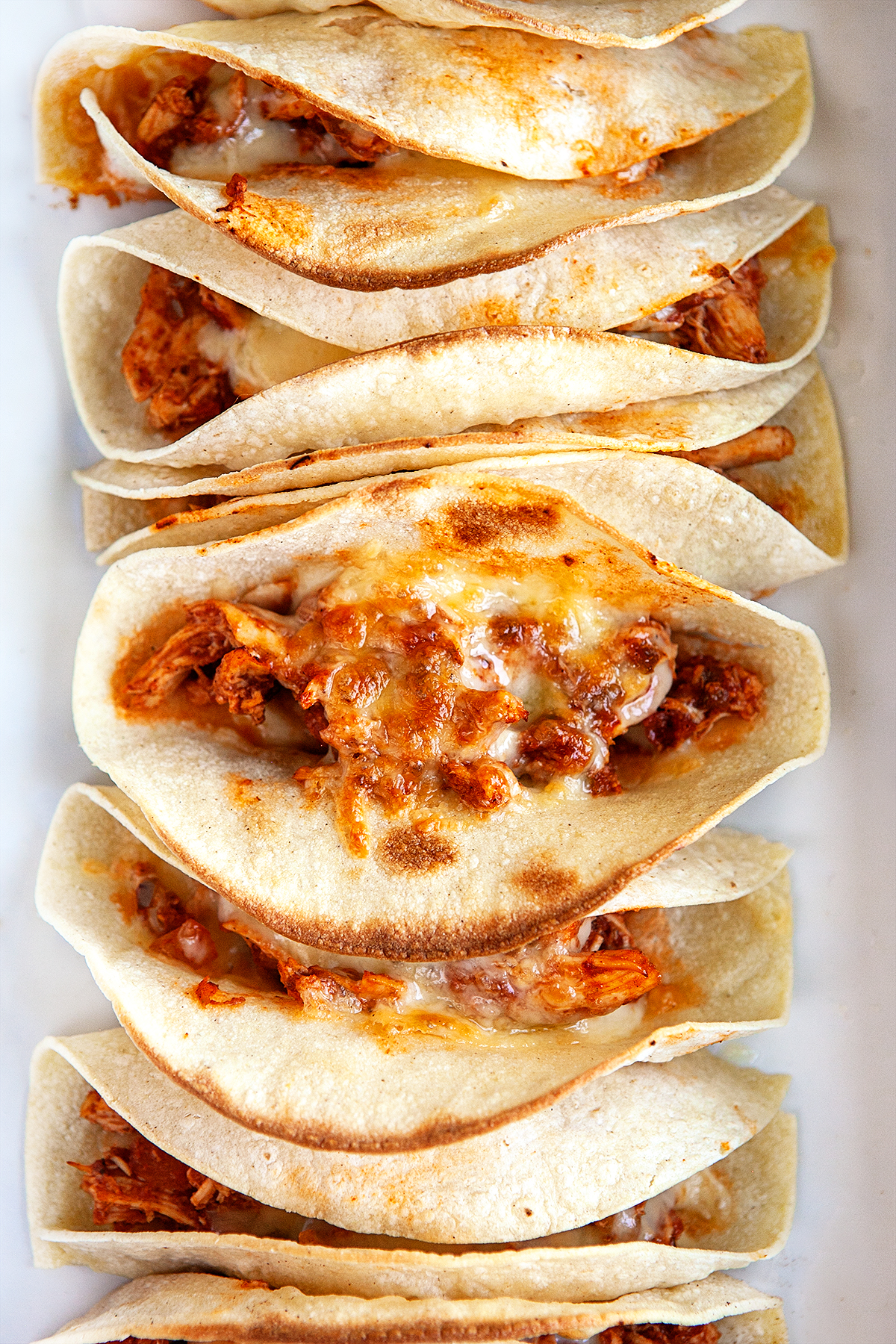 Overhead of tacos in a casserole from the oven