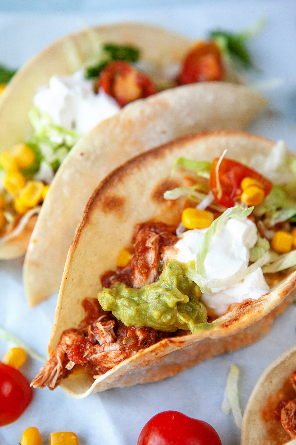 Closeup of rotisserie chicken tacos