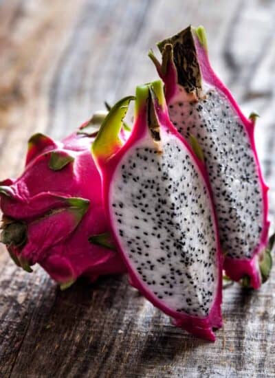 Dragon Fruit cut in quarters standing up.