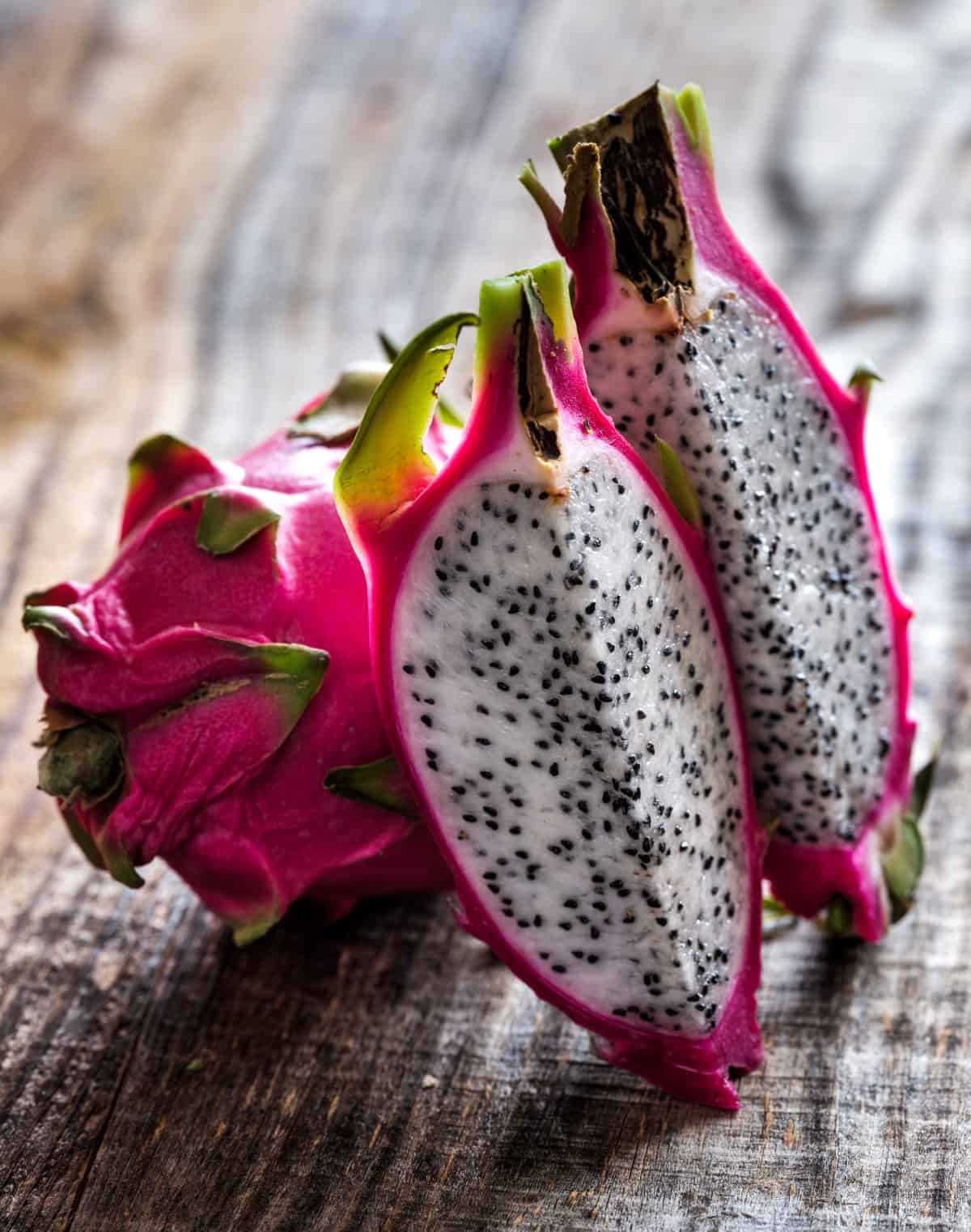 Pitaya fruits in closeup on a wooden board